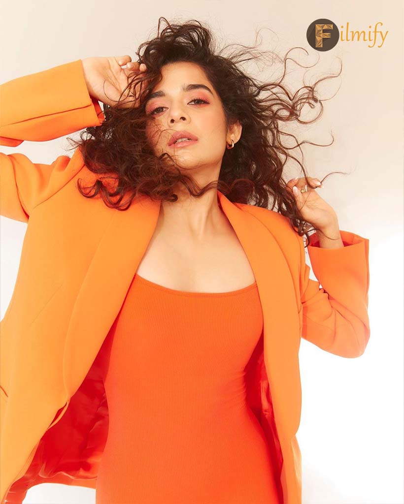 Mithila Palkar Flaunts herself in bright orange slim fit dress